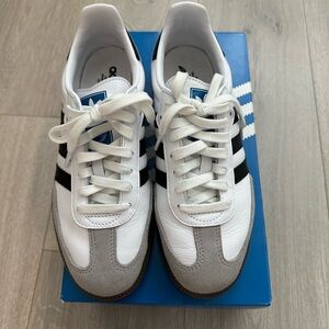 White and black Adidas Sambas